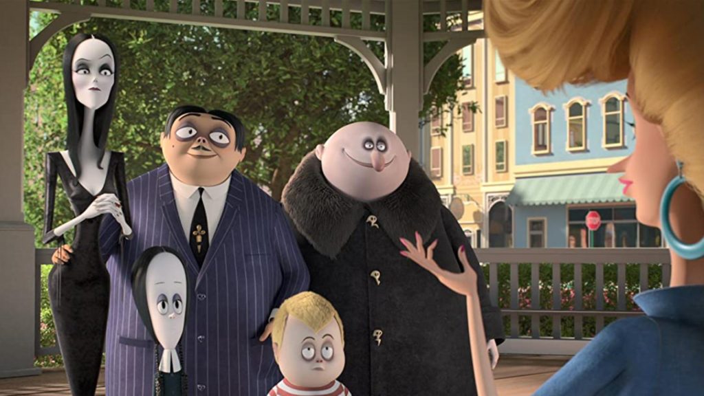 the-addams-family-standing-on-porch